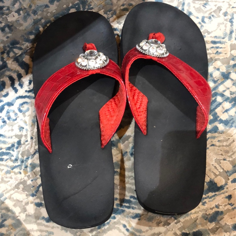 black and red flip flops